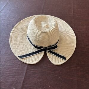 Elegant Straw Hat with Black Ribbon